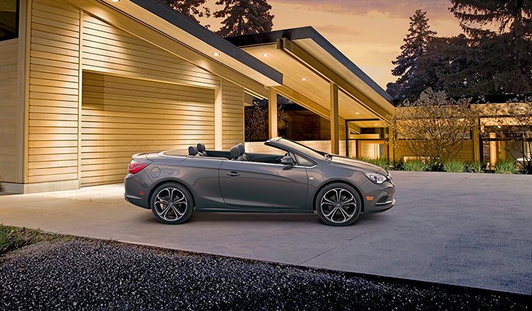 Car in front of a nice house | Earnhardt Buick GMC in MESA AZ